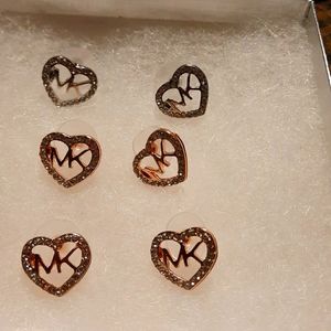 Mk heart shaped earrings with mk logo